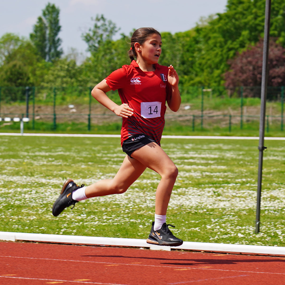 Year 5 girl running in the relay