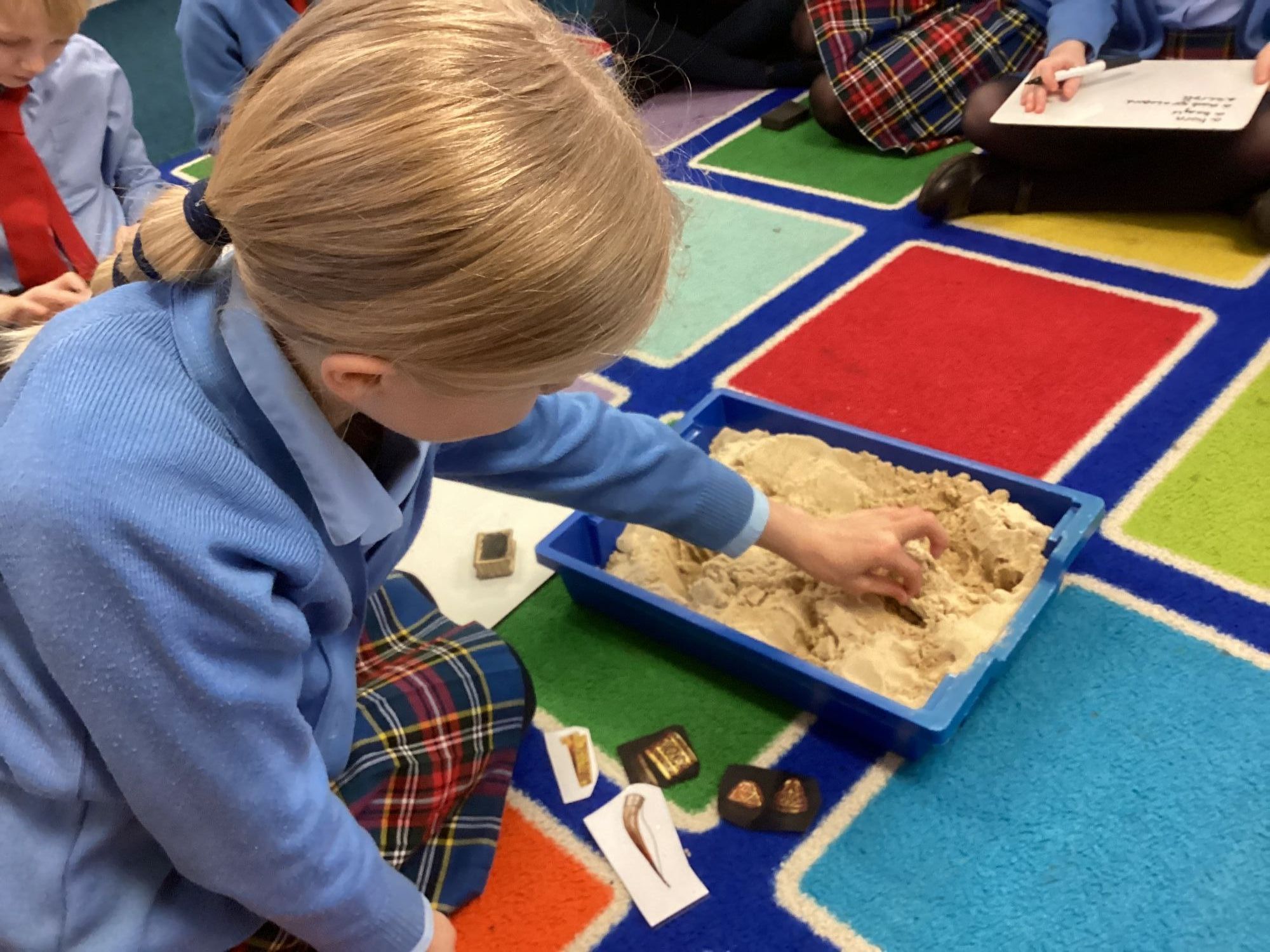 Lingfield Prep Pupil digging for archaeological treasures